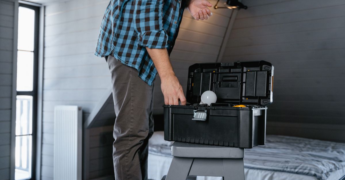 technician toolbox house entrance — Raleigh Pro Locksmith